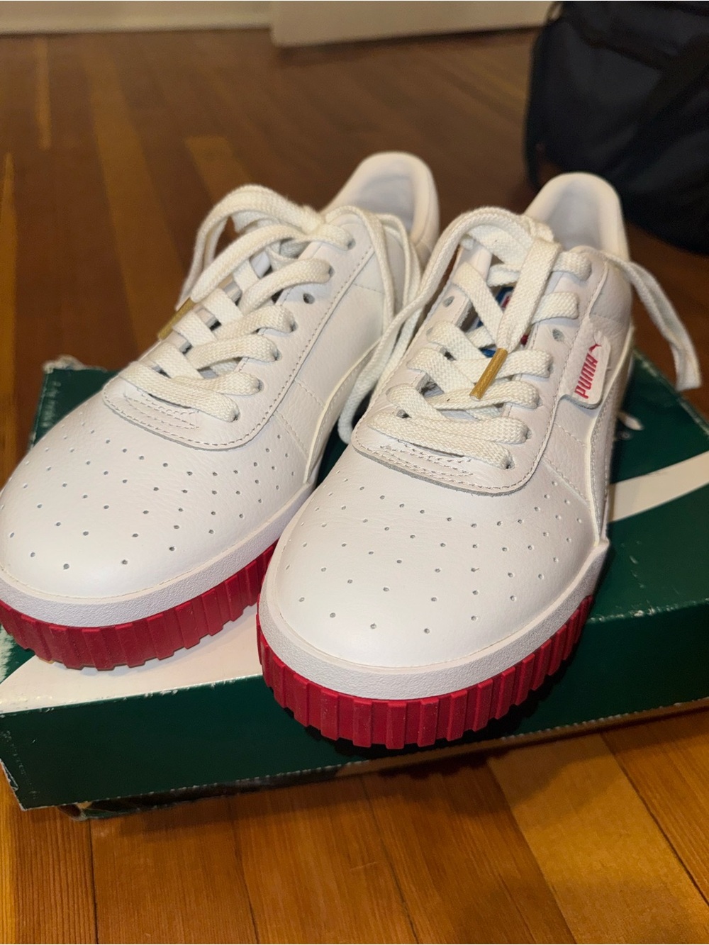 Puma Leather Sneakers with Red Ribbed Sole